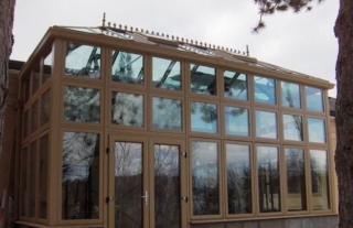 Exterior view of a Brown Edwardian-style Conservatory