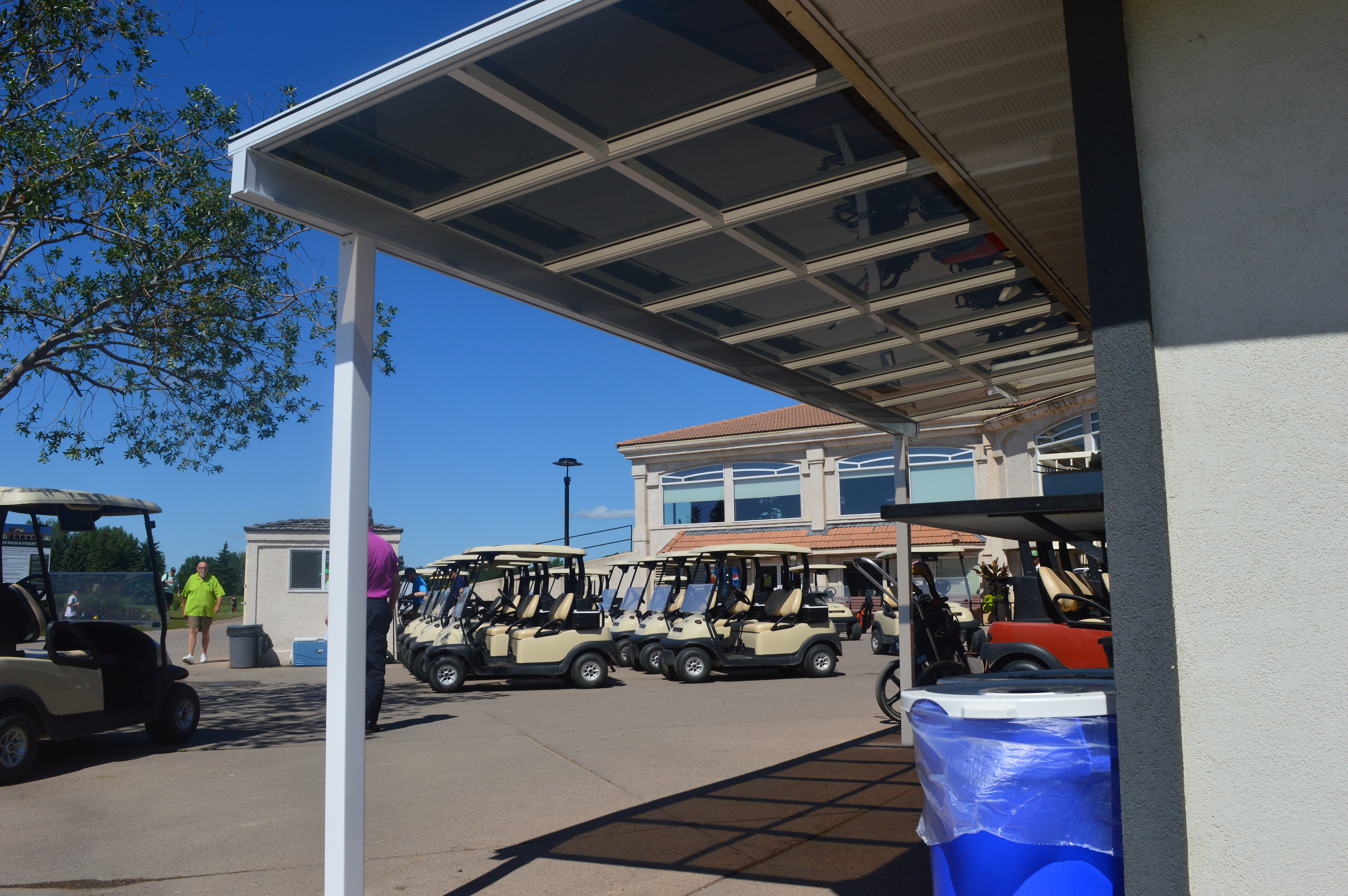 A small patio cover used to shade a lunch counter at a golf course