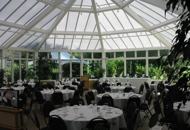 Interior view of a large white commercial conservatory