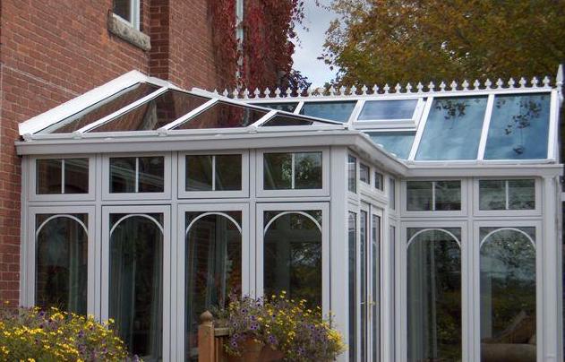White combined style conservatory on brick building