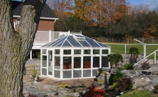 Exterior view of a free-standing garden conservatory