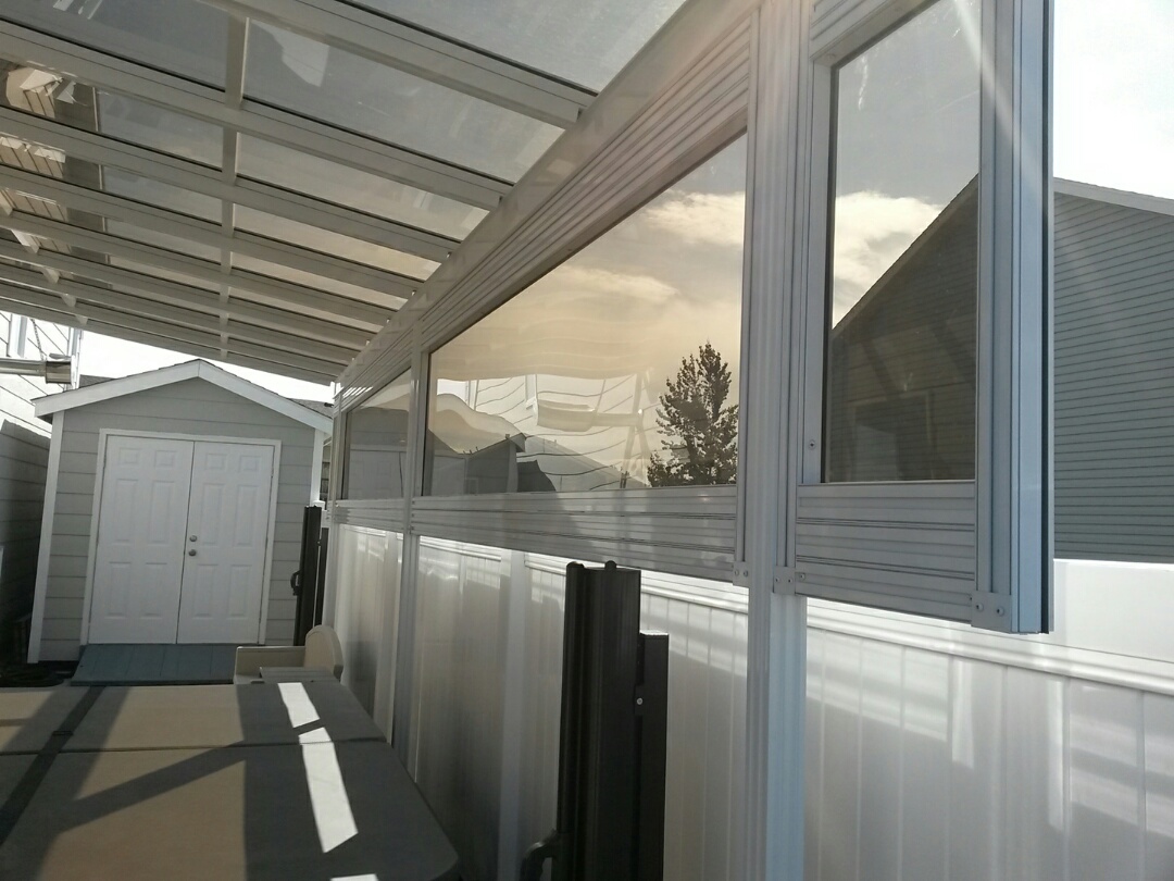Grey patio cover on exterior of house in Montana